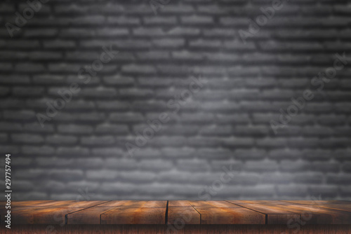 empty wooden table with smoke float up on dark background