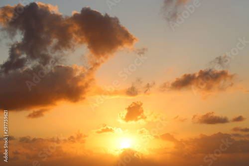 Beautiful orange sunset and sunrise sky © Dinadesign