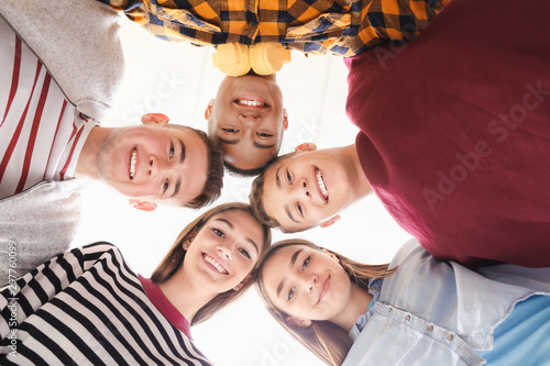 Fotografi Portrait of teenagers on white background, bottom view