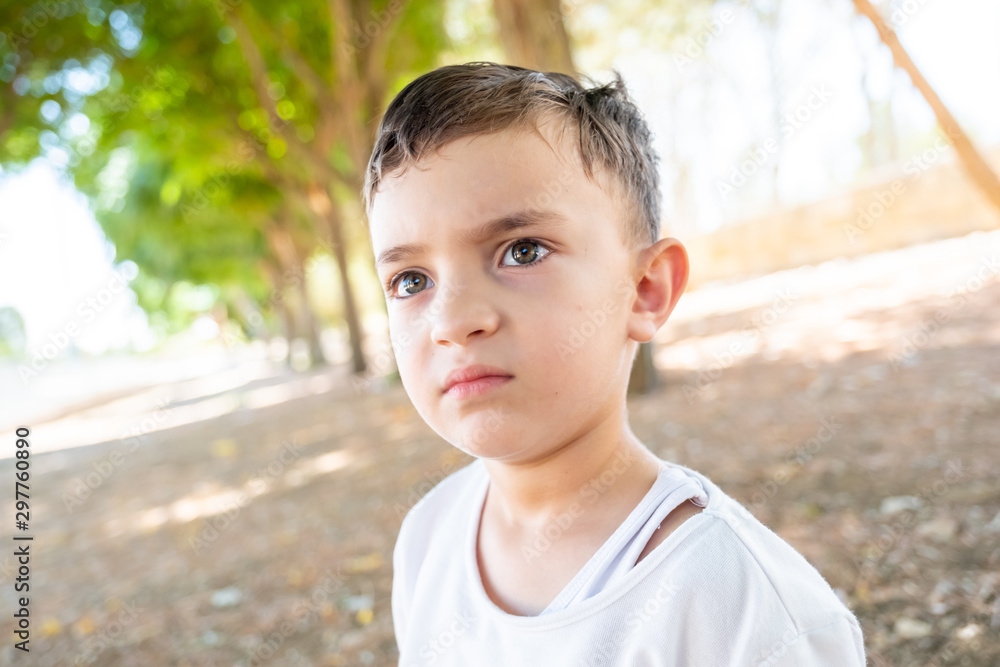 Happy muslim arabic boy playing in hte park Happy muslim arabic boy playing in hte park