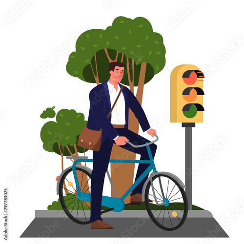 Businessman riding a bicycle in the city