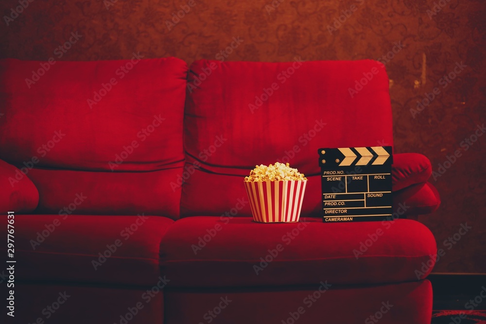 red sofa in cinema  - obrazy, fototapety, plakaty 