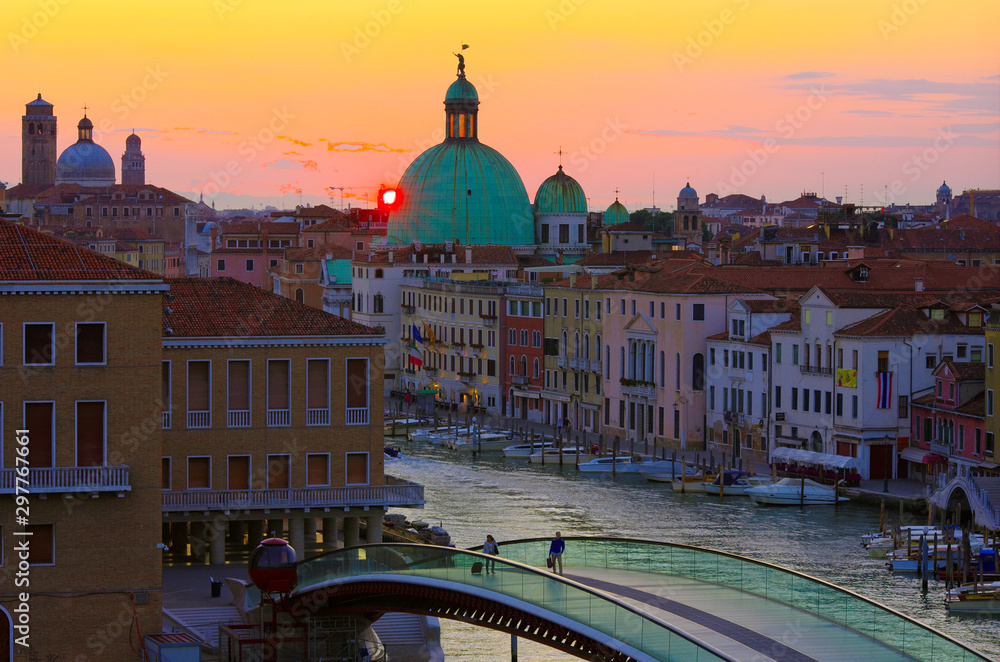 Venice at sunrise. View from the upper deck of a parking garage.