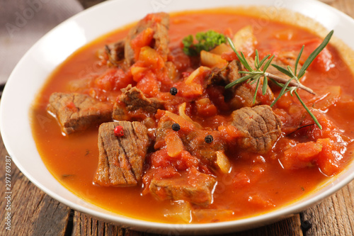 beef stew with tomato sauce and herbs