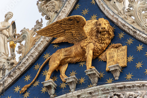 Venice, close up of the golden winged lion of St Mark, symbol of the evangelist and the Venetian Republic. Basilica and Cathedral of San Marco, UNESCO world heritage site, Veneto, Italy, Europe