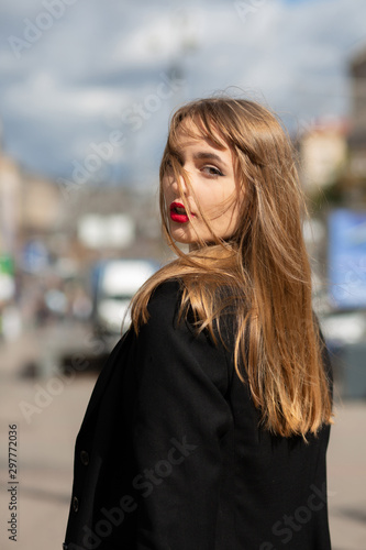 Outdoor portrait of attractive girl wears costume