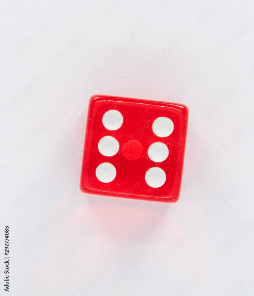 A red dice with the number six to play A red dice with the number six to play