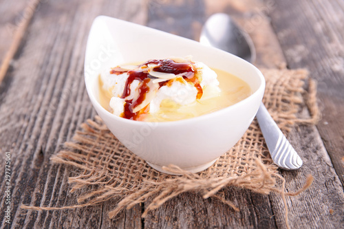 floating island with whipped egg and caramel photo