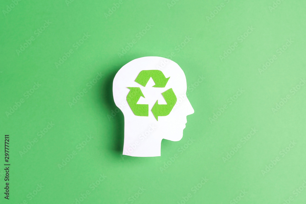 Head profile silhouette with recycle symbol on green background. Head profile silhouette with recycle symbol on green background.