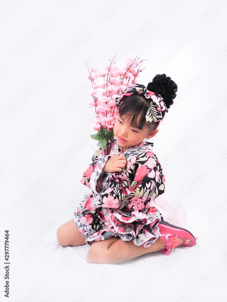 asian little girl and boy playing Wearing yukata on white backgound asian little girl and boy playing Wearing yukata on white backgound