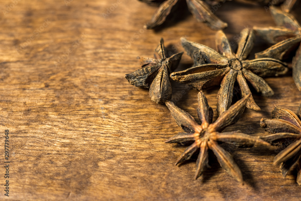 aroma star anise isolated on wooden background aroma star anise isolated on wooden background