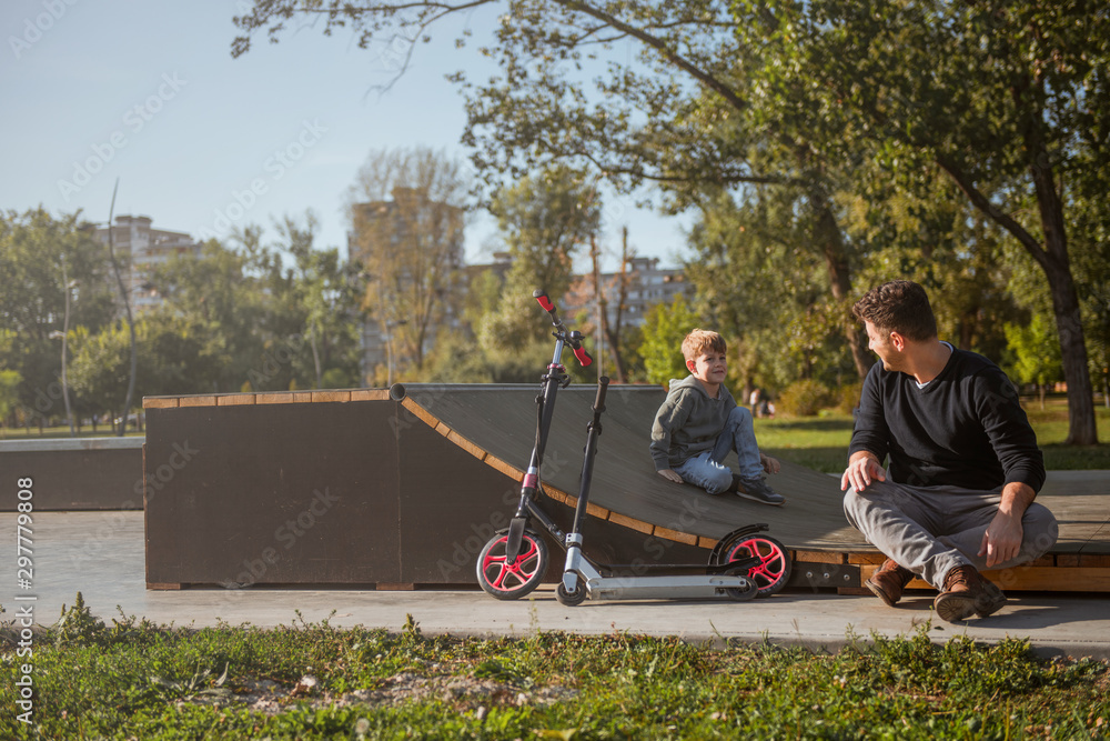 Father and son enjoying day in the park Father and son enjoying day in the park