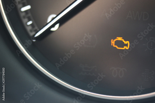 Check engine light in vehicle tachometer