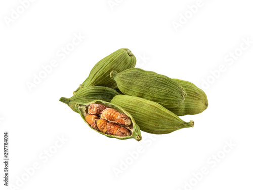 Obraz na płótnie Green cardamom pods with seeds isolated on white background with copy space for text or images. Spices, food, cooking concept. Close-up shot. w salonie