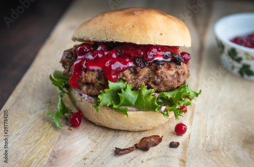 Homemade moose burger with lingonberry jam