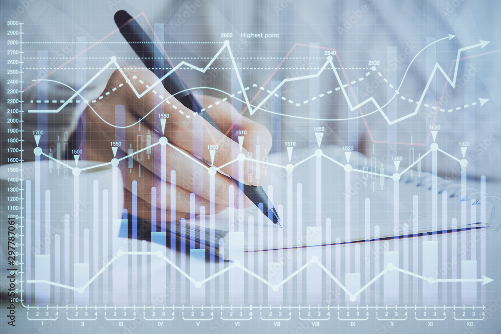 Forex chart displayed on woman's hand taking notes background. Concept of research. Double exposure Forex chart displayed on woman's hand taking notes background. Concept of research. Double exposure