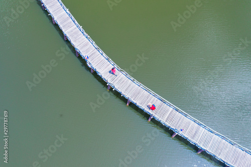 Aerial view of wood bridge cross the river and blusky with cloud in Chumphon province. photo