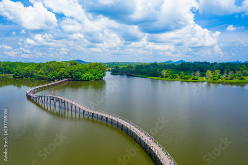 Aerial view of wood bridge cross the river and blusky with cloud in Chumphon province. photo