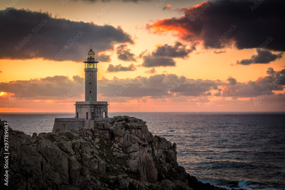 Punta Nariga lighthouse at sunset.malpica, Galicia, Spain.