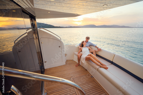 Loving couple on the yacht.