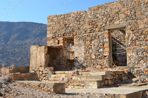 Ancient ruins of a fortified leper colony. Spinalonga island, Crete, Greece. photo