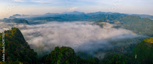 Aerial view of mountains with cloud cover mountain at sunrise and blue sky in Surat Thani Province  Thailand.