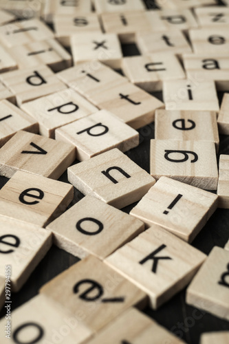 Alphabet letters on wooden scrabble pieces