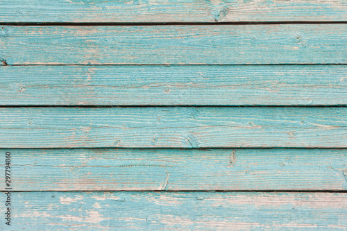 blue wooden background, old wooden wall with remnants of turquoise paint