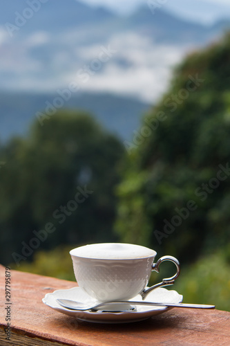 Coffee in the morning mountain background