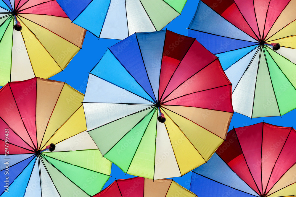 Colorful umbrellas Adorn on the sky.