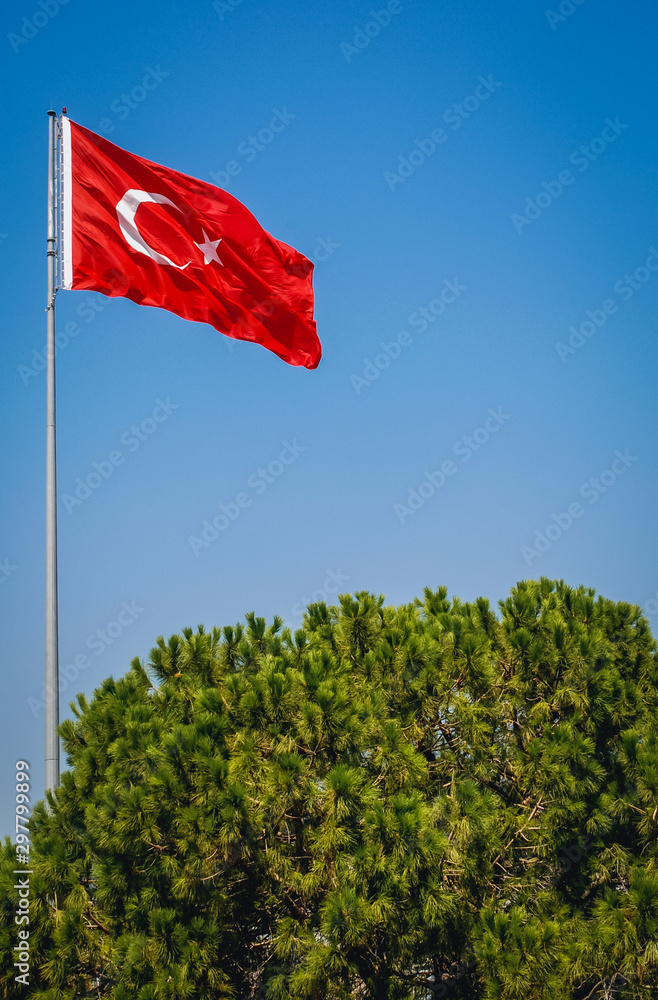 Turkish flag in Bodrum fortress in the port city of Bodrum, Turkey