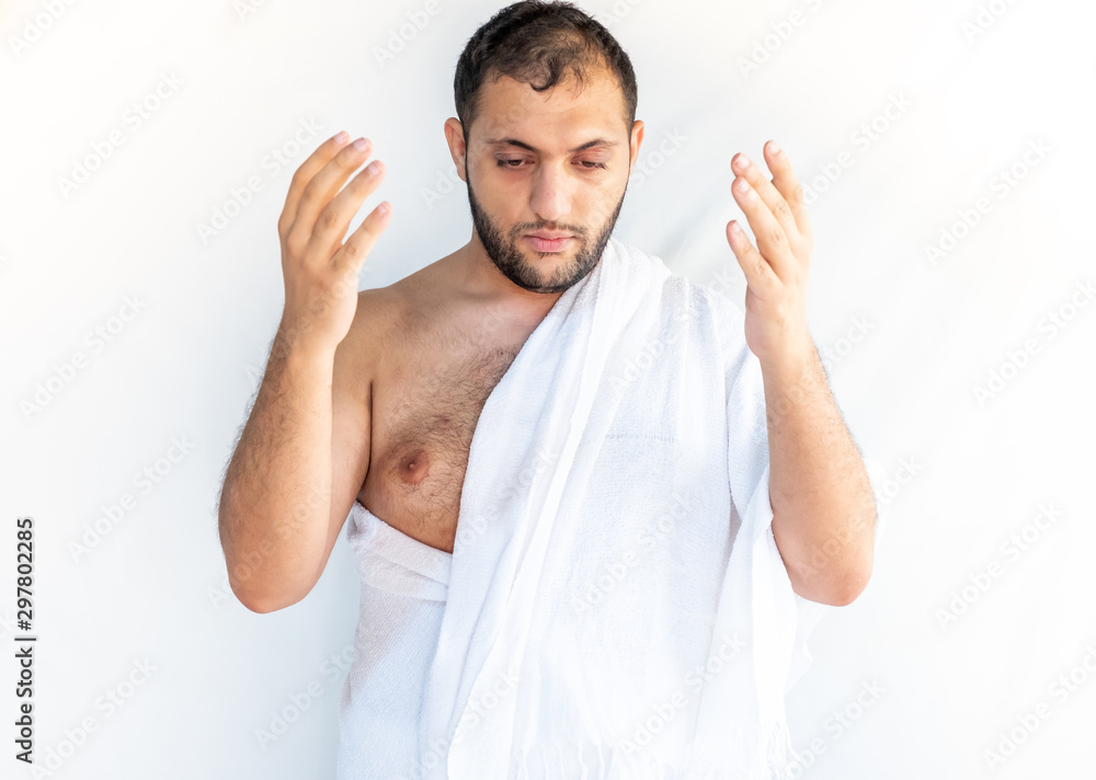 Arabic muslim man praying for god with his hands and doing doaa Arabic muslim man praying for god with his hands and doing doaa