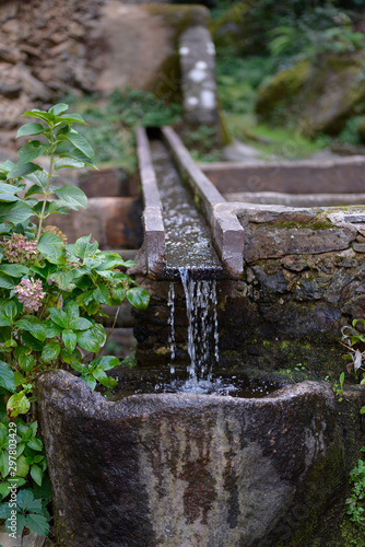 Water fountain detail in Robledillo de Gata in Extremadura, Spain