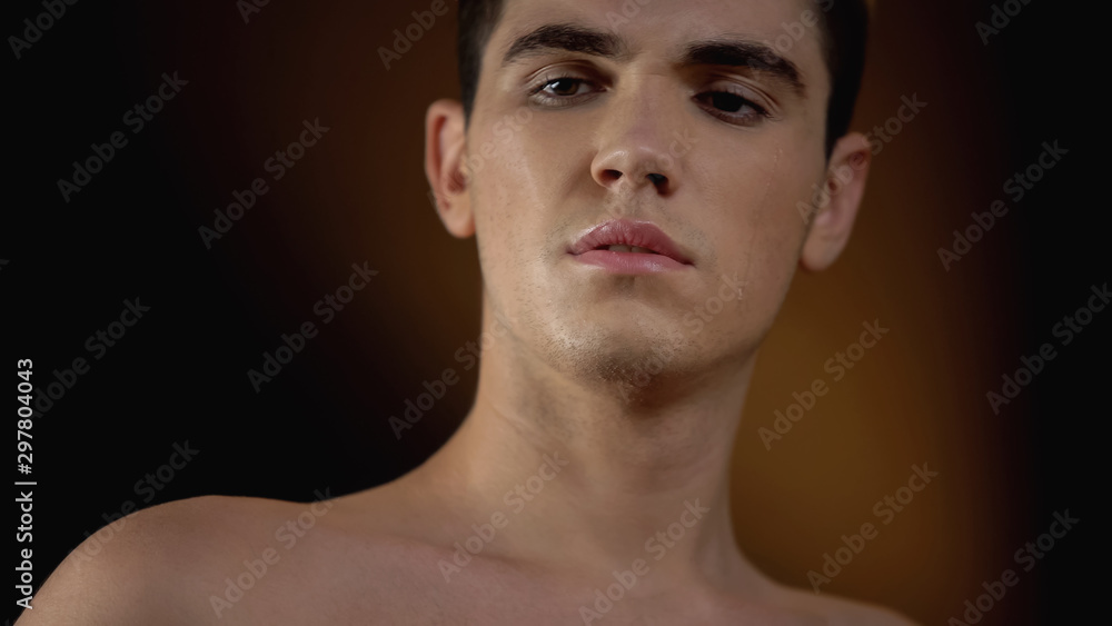 Gender-fluid person crying in dress, feeling ugly in male body, sexual bullying Gender-fluid person crying in dress, feeling ugly in male body, sexual bullying