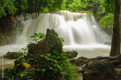 Huai Mae Khamin waterfall in the rainy season with turbid water In the abundant natural forest