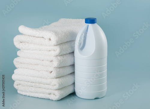 laundry launderer bleach bottles and terry towel