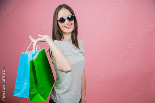 beautiful girl holding shopping bags