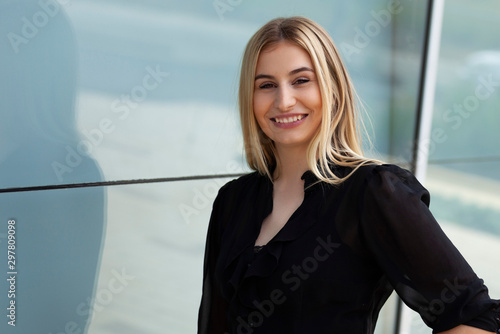 Young woman in business office clothing and negative space