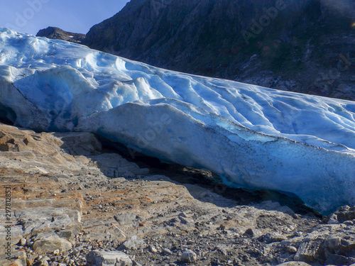 Close-up of high-resolution air view of the glacier with blue glacier ice