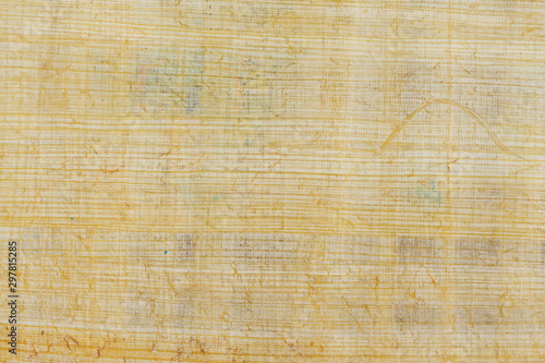 Texture of yellow natural old papyrus paper background