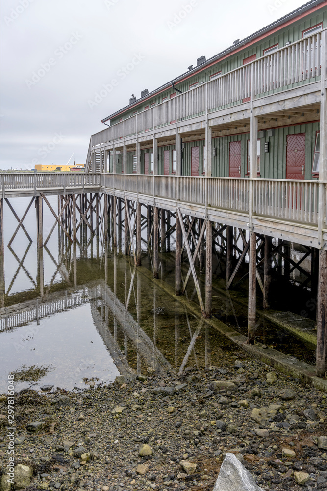 traditional stilt buildings at harbor, Andenes, Norway