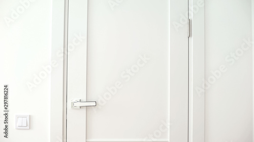Closed white door hotel or house room, accommodation forbidden area, hotel suite