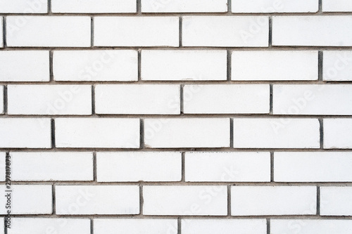 White brick wall background with cement grout