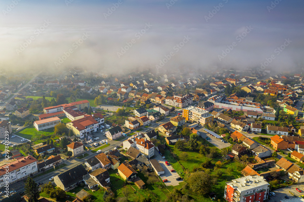 Fototapeta premium Bjelovar over clouds from above 