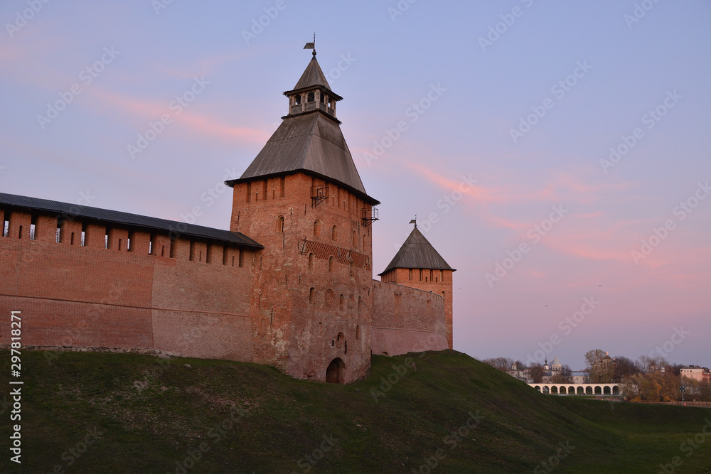 Novgorod Kremlin. Veliky Novgorod. Spasskaya and Palace towers against the blue sky and Yaroslav's courtyard