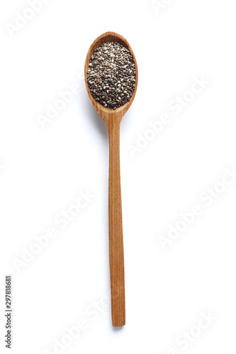 Сhia seeds in a spoon isolated on white background