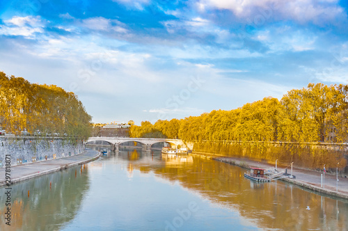 Rome city view with tiber river at dusk photo