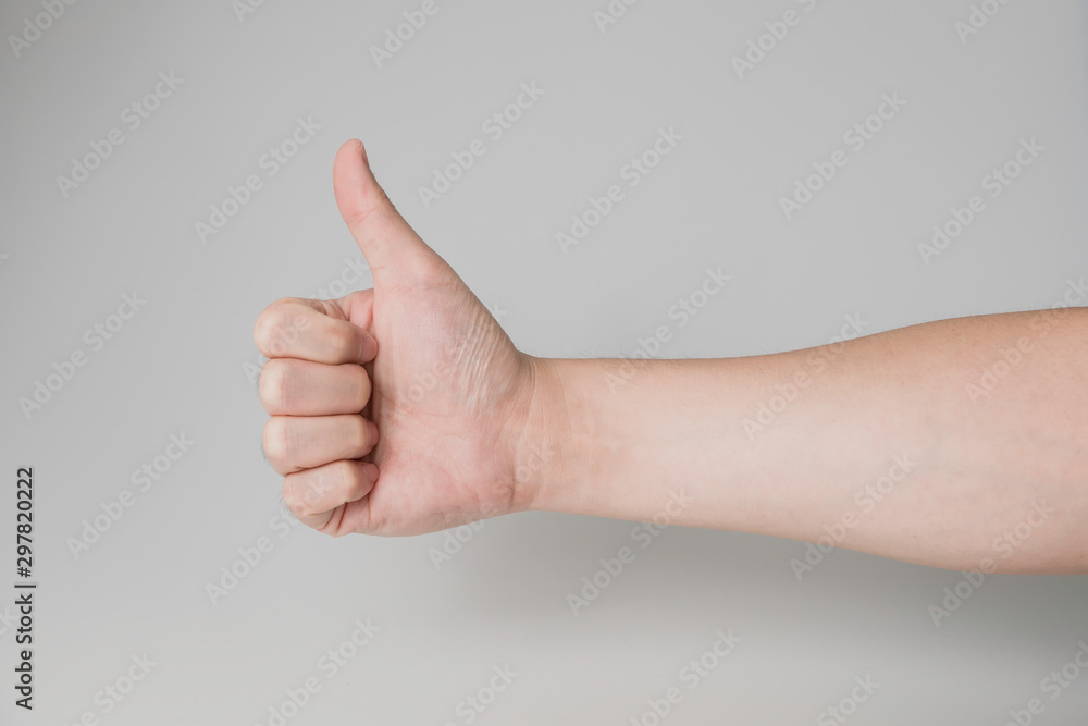 Hand symbol, likes thumb up of right hand with white background and clipping path