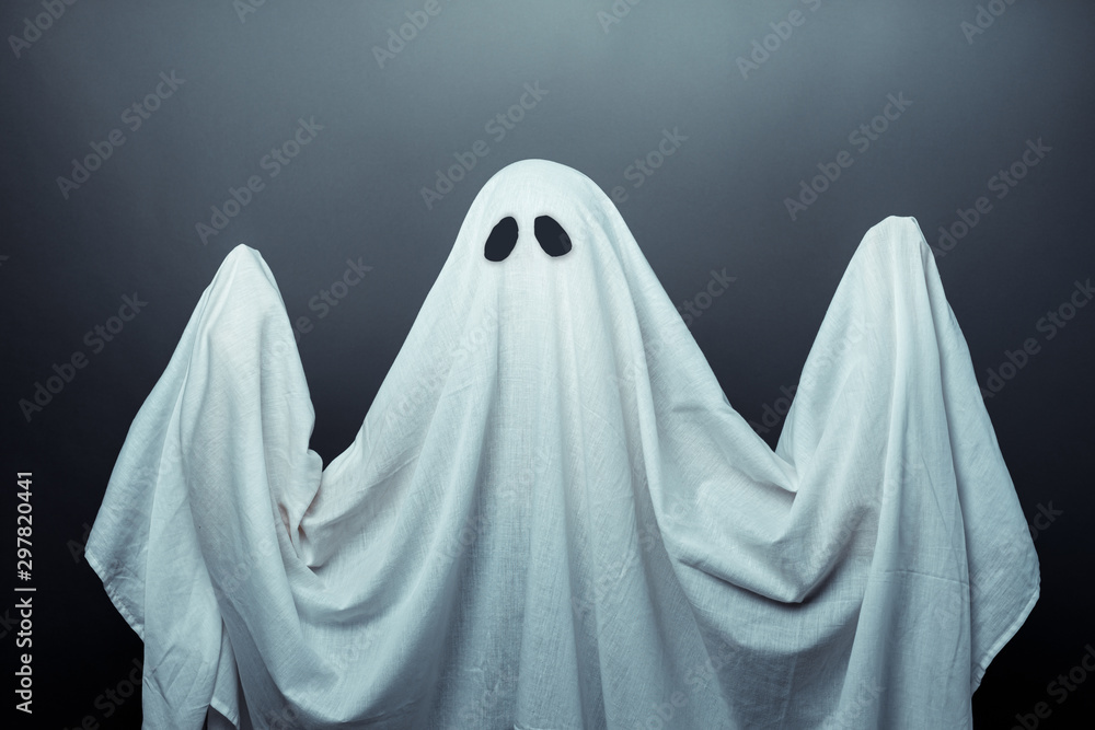 Spooky white ghost. Halloween horror concept Spooky white ghost. Halloween horror concept
