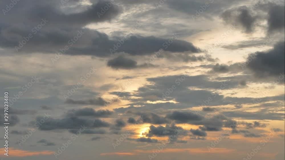The black rain clouds were moving slowly at sunset time. The black rain clouds were moving slowly at sunset time.